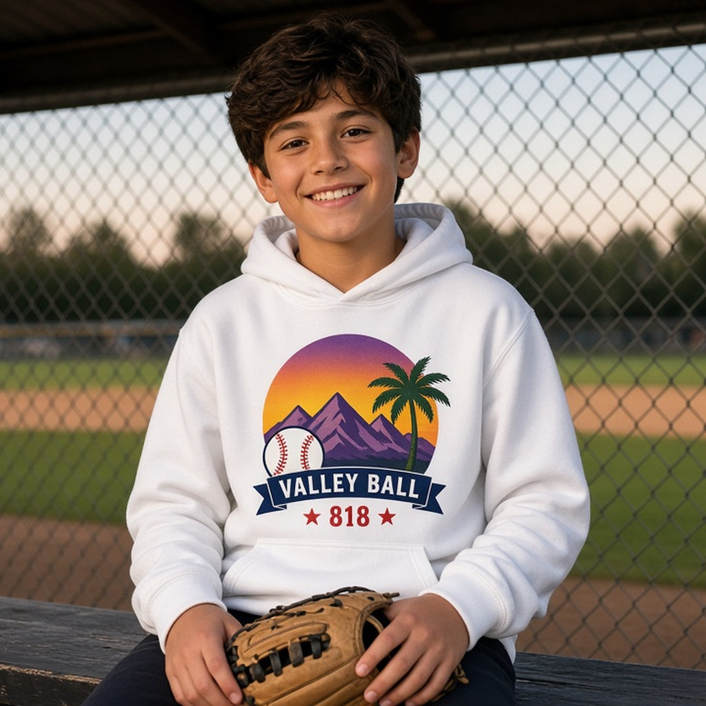 Valley Ball 818 youth hoodie on a kid in the dugout